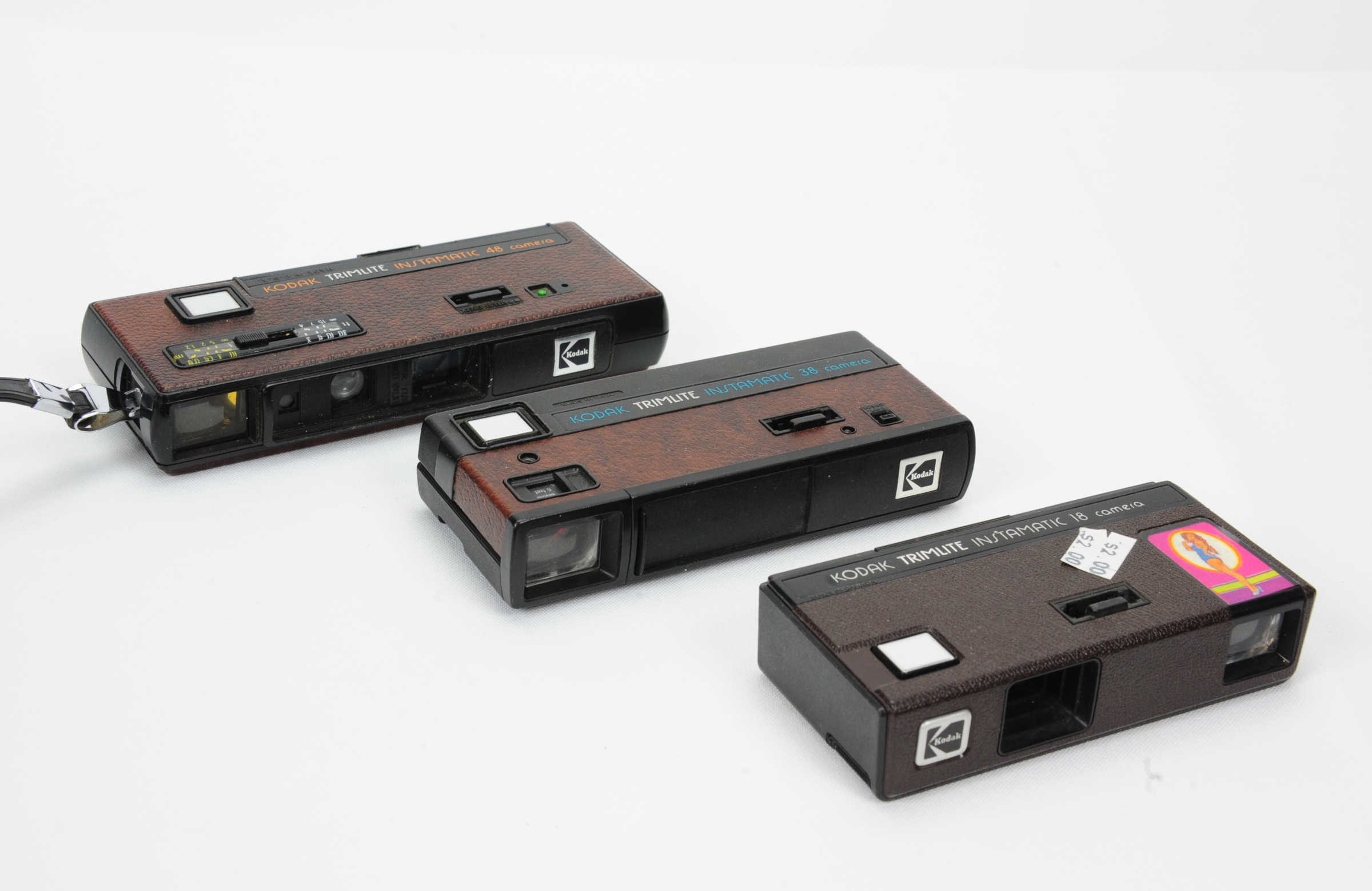 Three Kodak Trimlite cameras